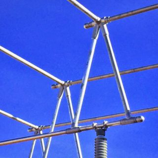 Custom bus A-frame tee connector PLK1651 by DMC Power, designed for electrical applications